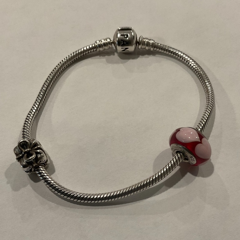 Pandora bracelet with 2 charms